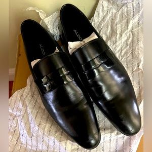 Dress up formal black loafer, black patent leather trim. Never been worn.
